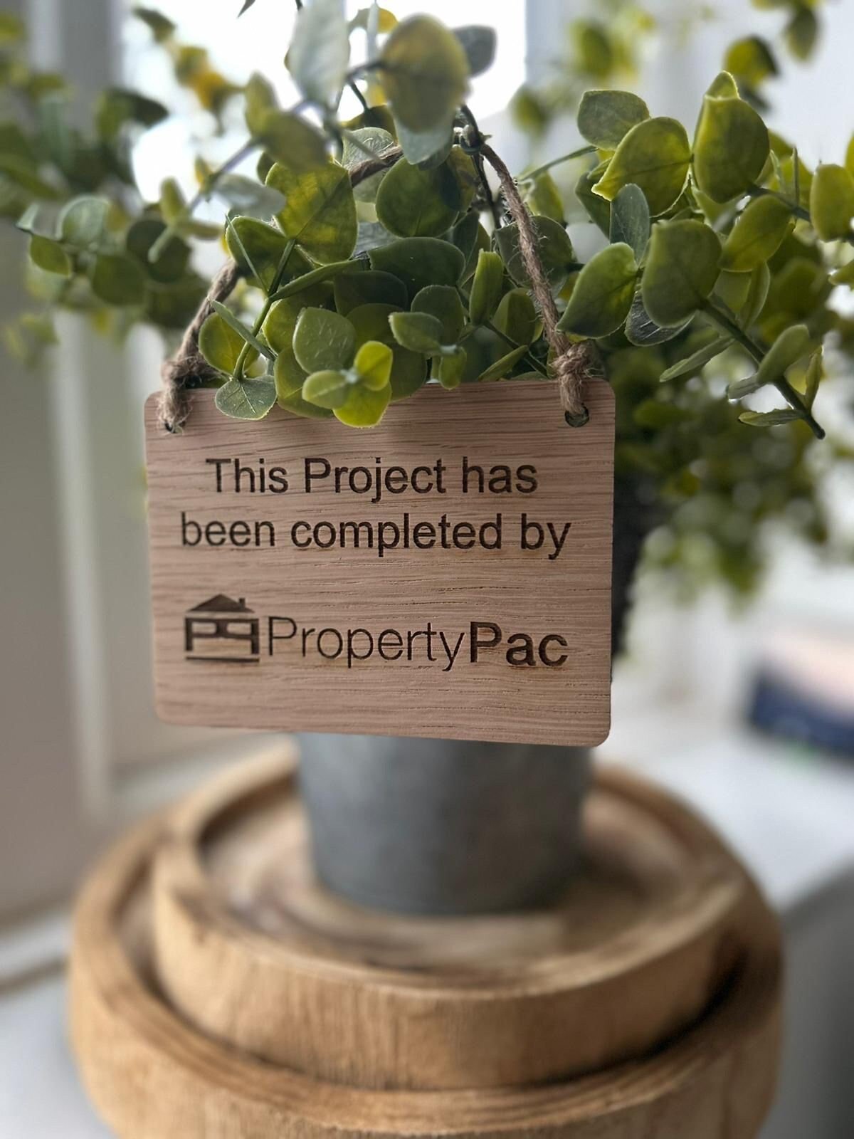 Personalised oak hanging sign reverse — pre-drilled holes and jute string loop