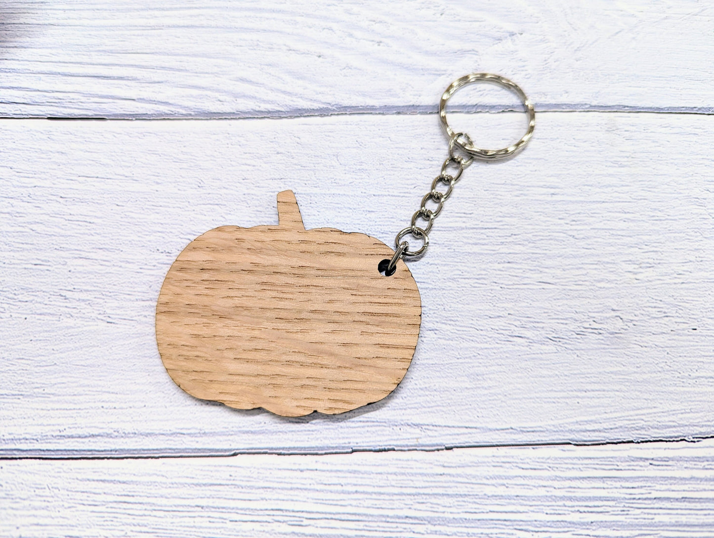 Oak pumpkin-shaped keyring — 4mm oak veneered MDF, laser engraved to order