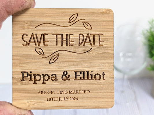 Personalised bamboo save the date coaster with leaf border design, 90mm, laser engraved