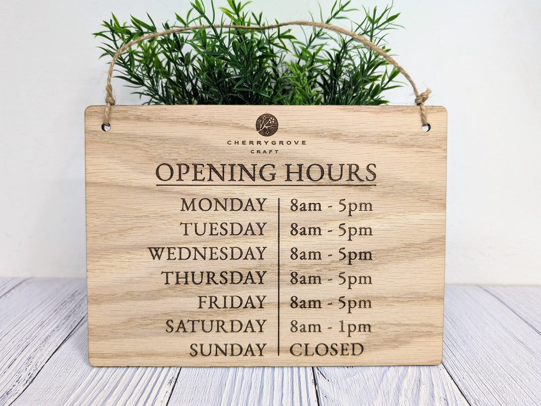 Custom oak opening hours sign with a business logo, engraved on FSC-certified oak veneered MDF