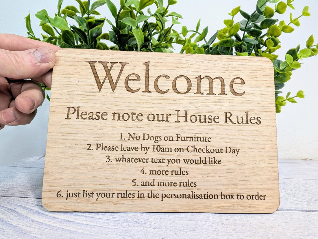 A5 landscape oak house rules sign standing on its flat-pack wooden stand