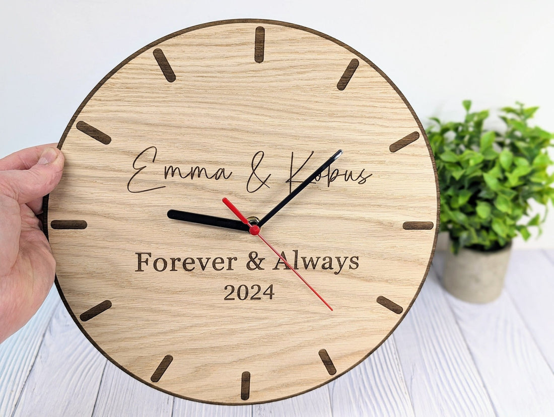Personalised wedding couple wall clock — oak, names and date engraved, 30cm