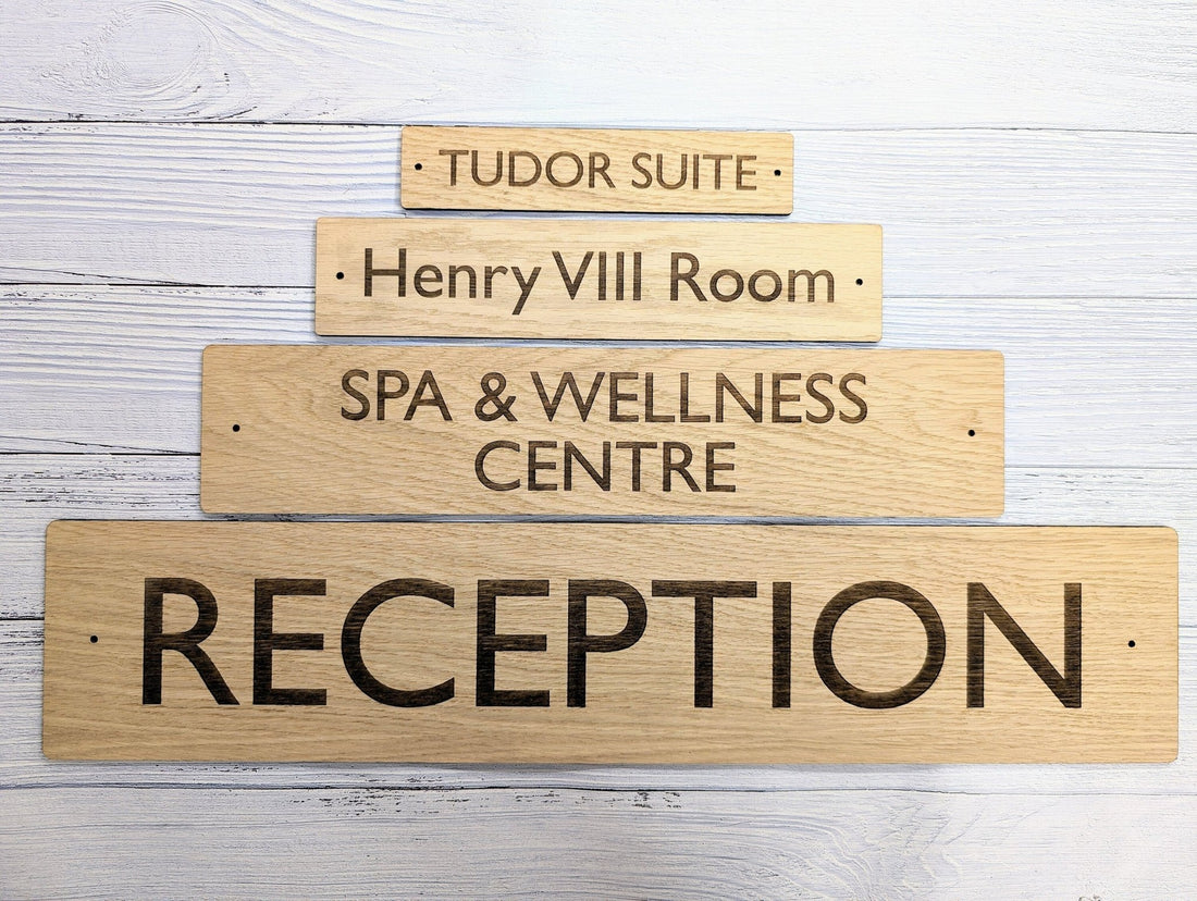 Custom oak hotel room signs in four sizes engraved Tudor Suite, Reception and Spa & Wellness
