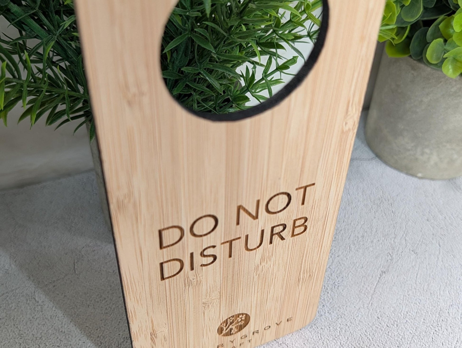 5mm bamboo door hanger close-up showing Cherry Grove Craft engraved logo
