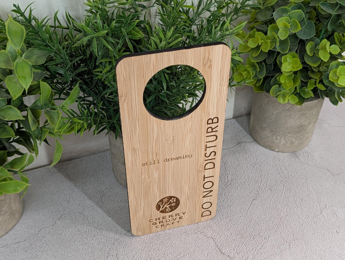 5mm bamboo vertical door hanger with personalised guesthouse logo engraved
