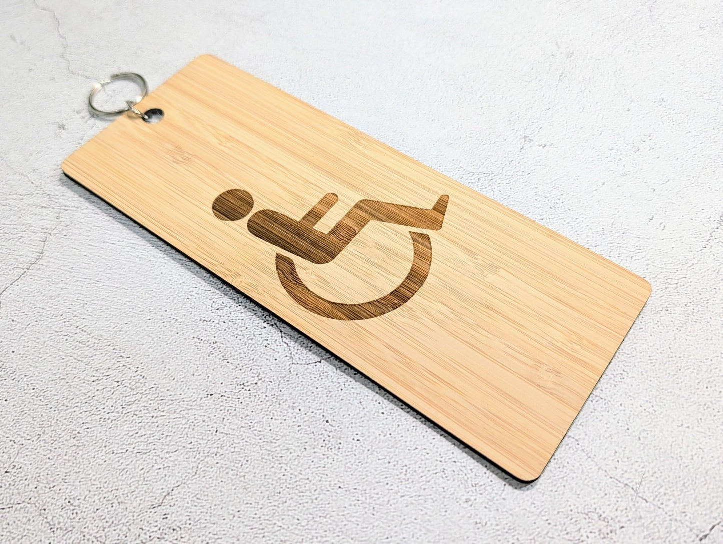 Accessible Bathroom Keyring – Large Bamboo Key Tag, Engraved Wheelchair Symbol, Eco - Friendly Design, Durable and Lightweight, Handmade - CherryGroveCraft