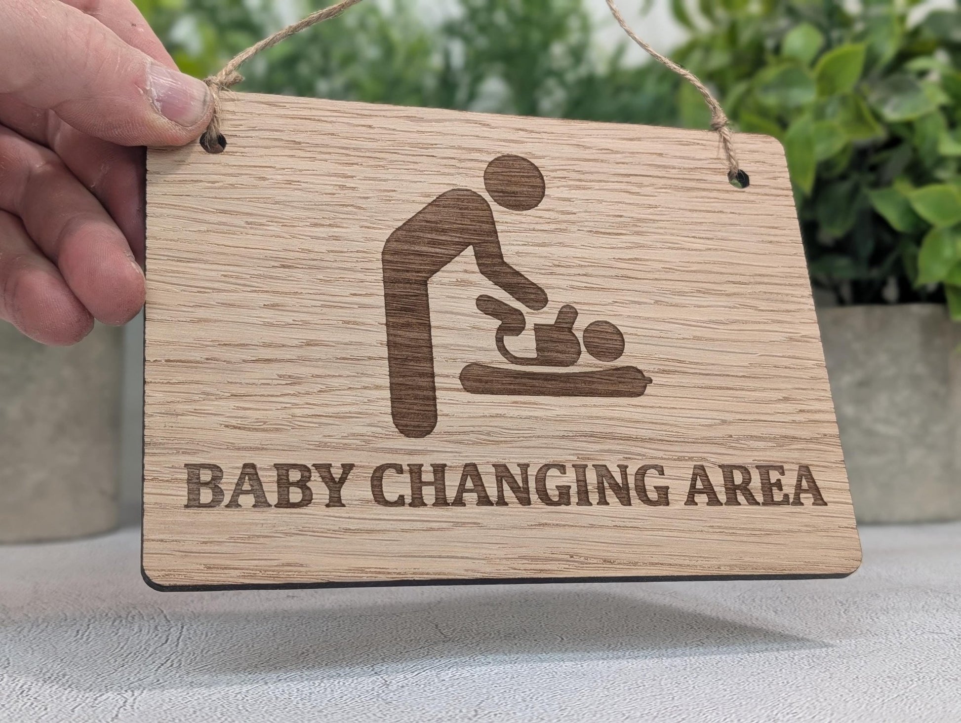 Baby changing area oak sign — medium size, laser-engraved, natural finish
