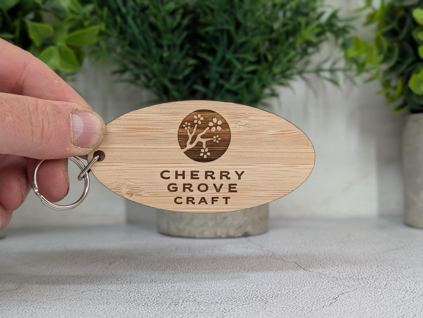 5mm bamboo keyring close-up showing engraved detail and thickness