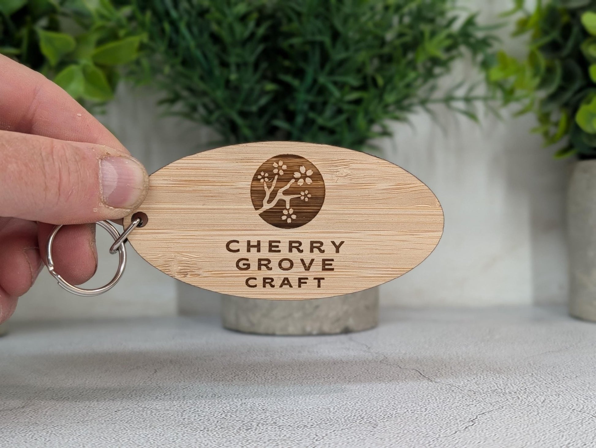 5mm bamboo keyring close-up showing engraved detail and thickness