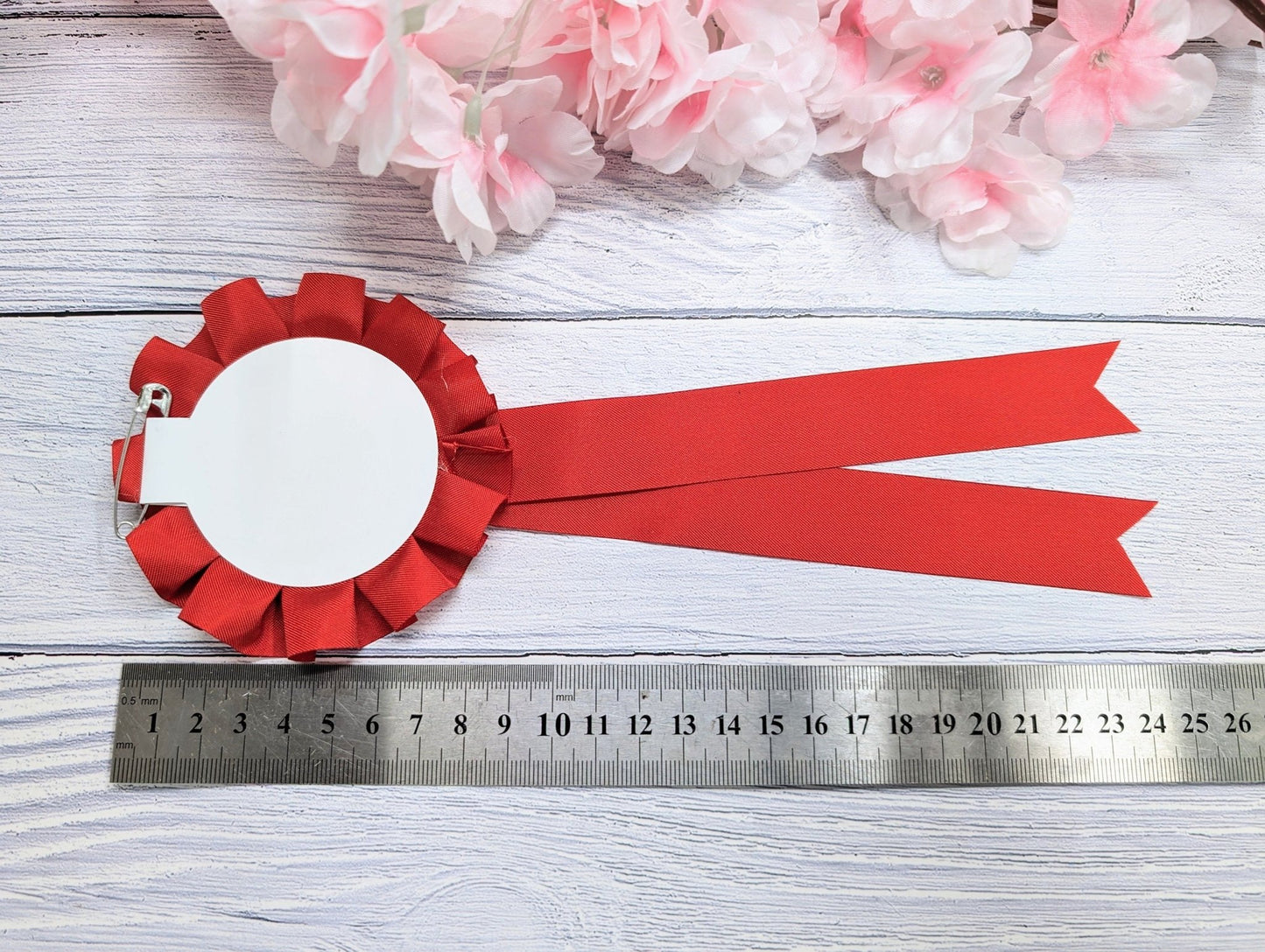 Best Mum and Best Dad rosettes shown as a pair — oak, four ribbon colours