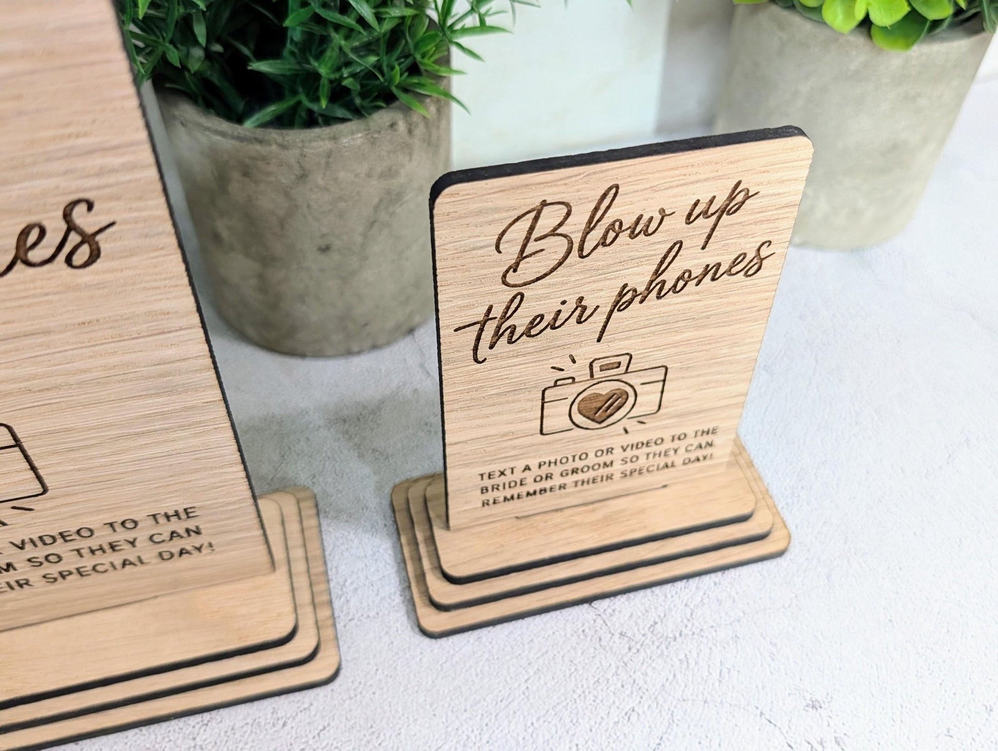 Wedding photo sign with an optional engraved phone number for guests to text