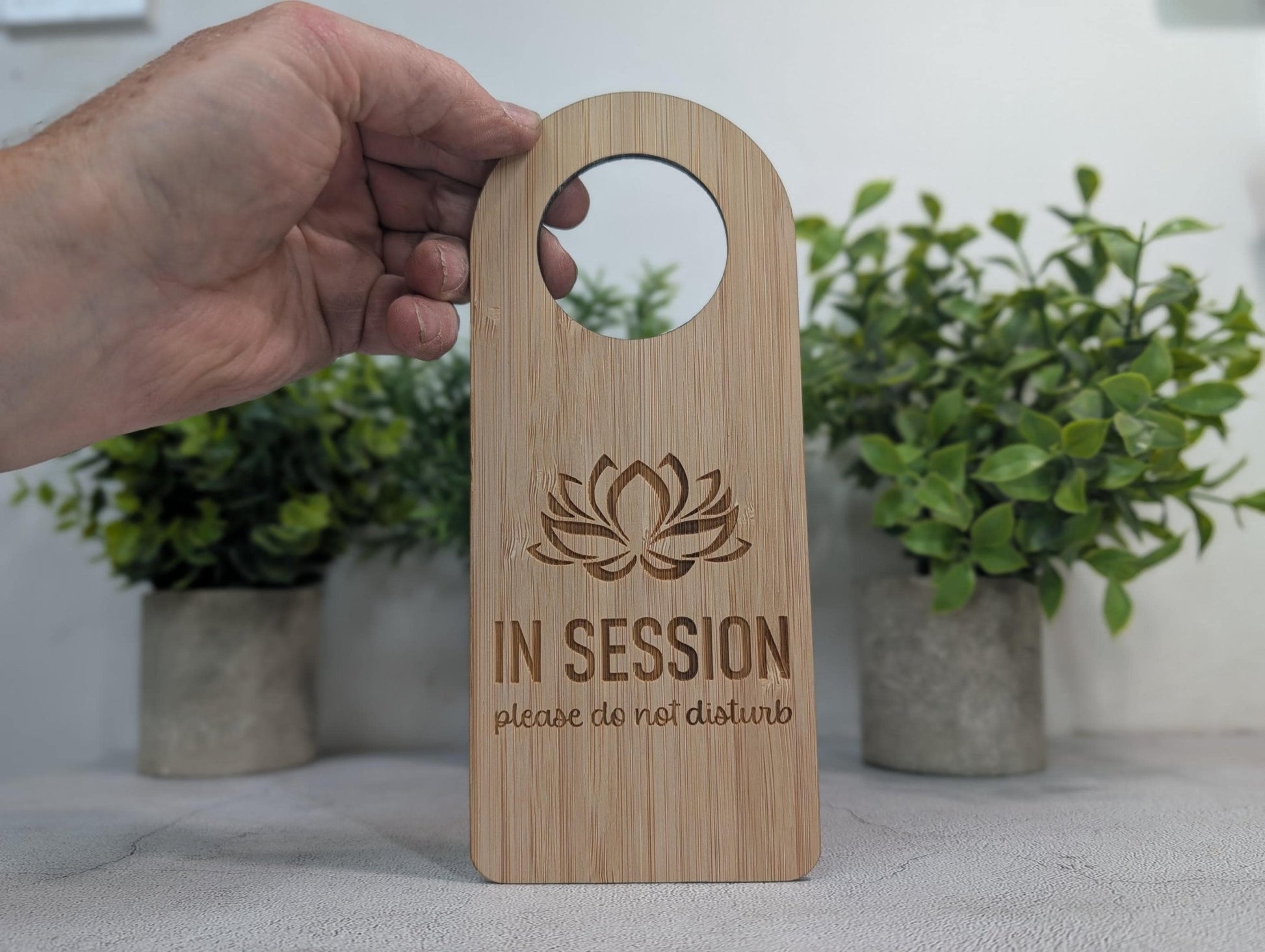 In Session door hanger for counselling and private practice rooms, FSC-certified bamboo, hanging on door handle