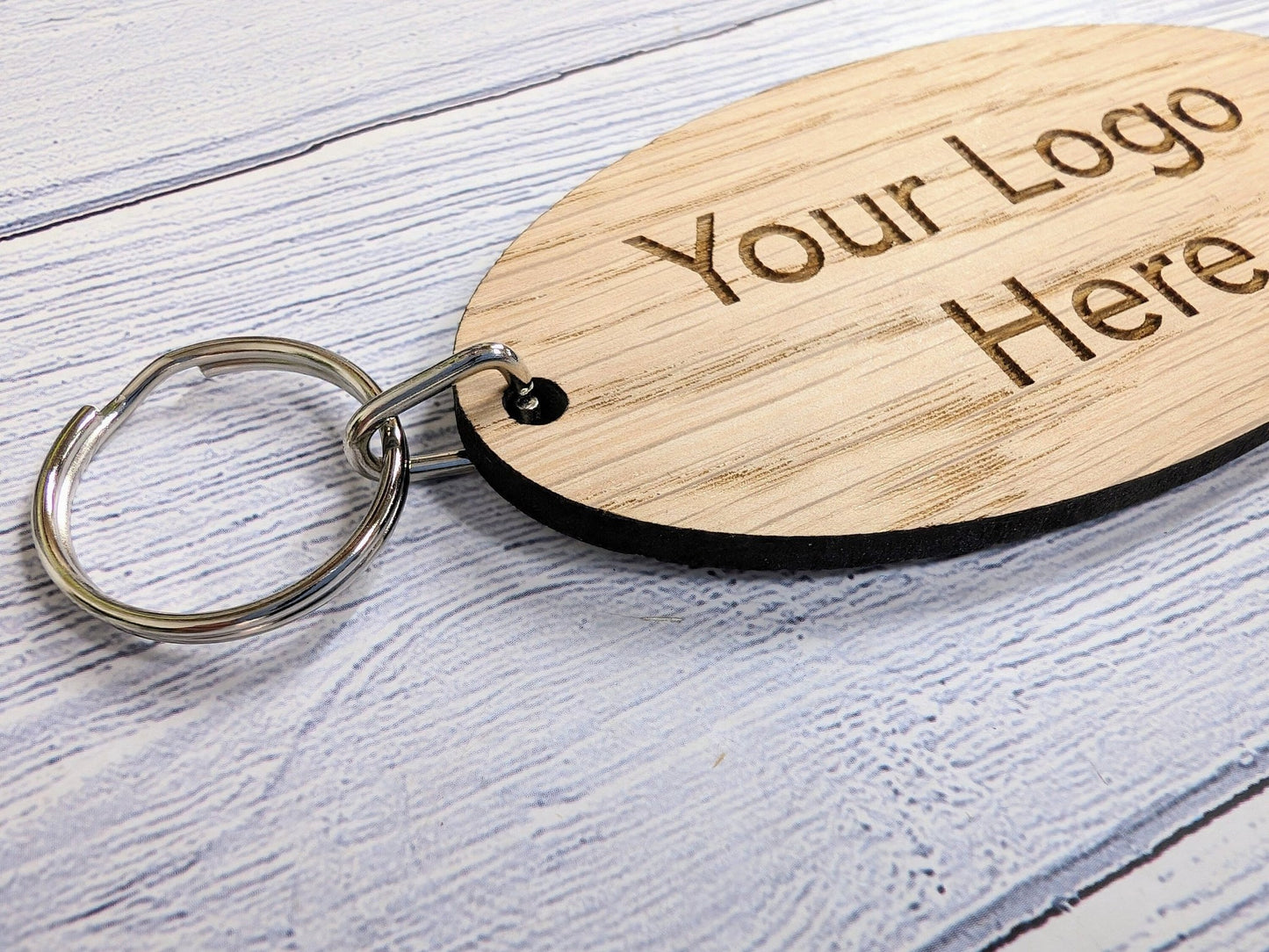 Large oval oak keyring reverse — smooth veneer, metal split ring