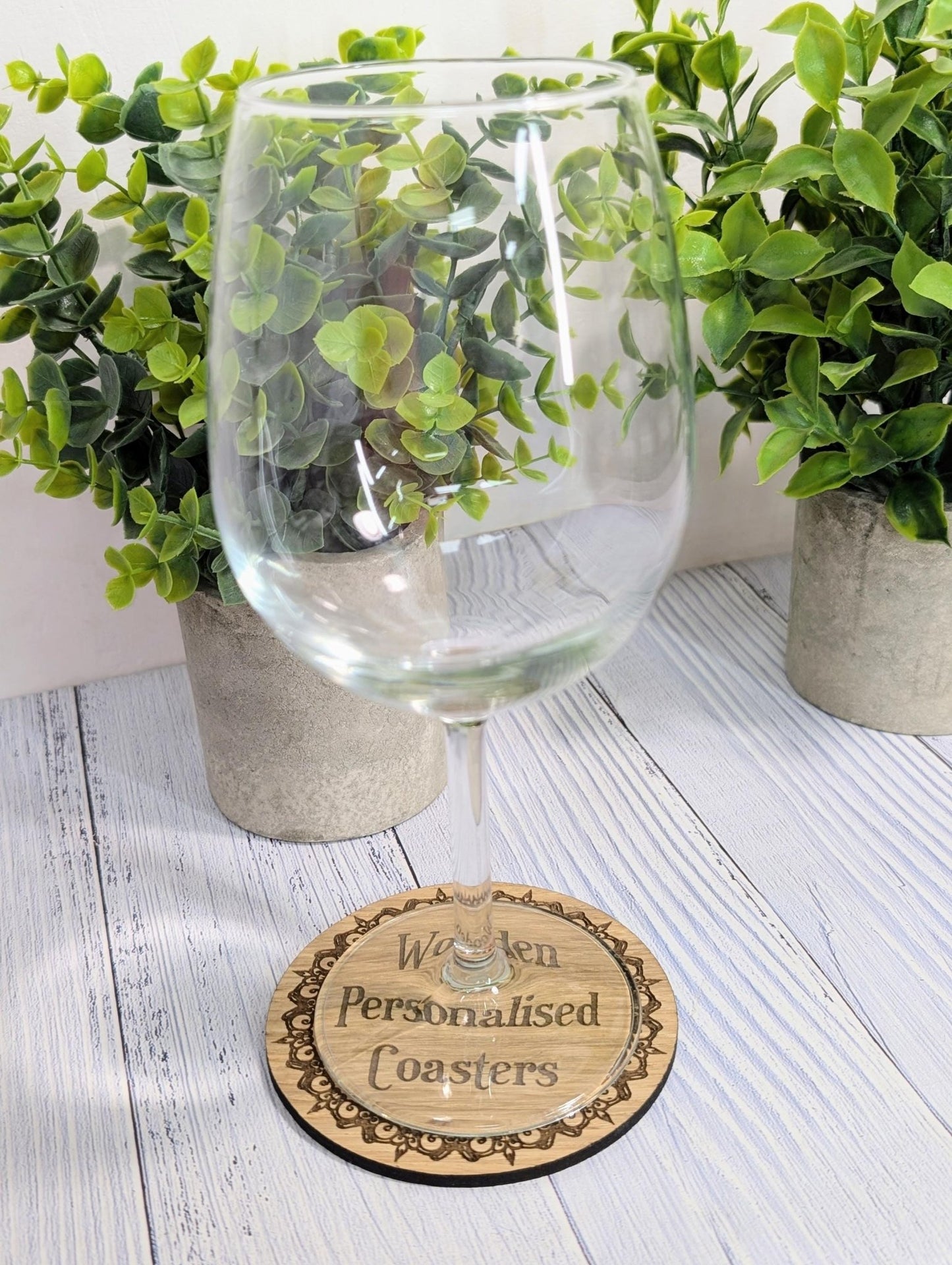 Personalised oak coaster with engraved border — made in North Wales