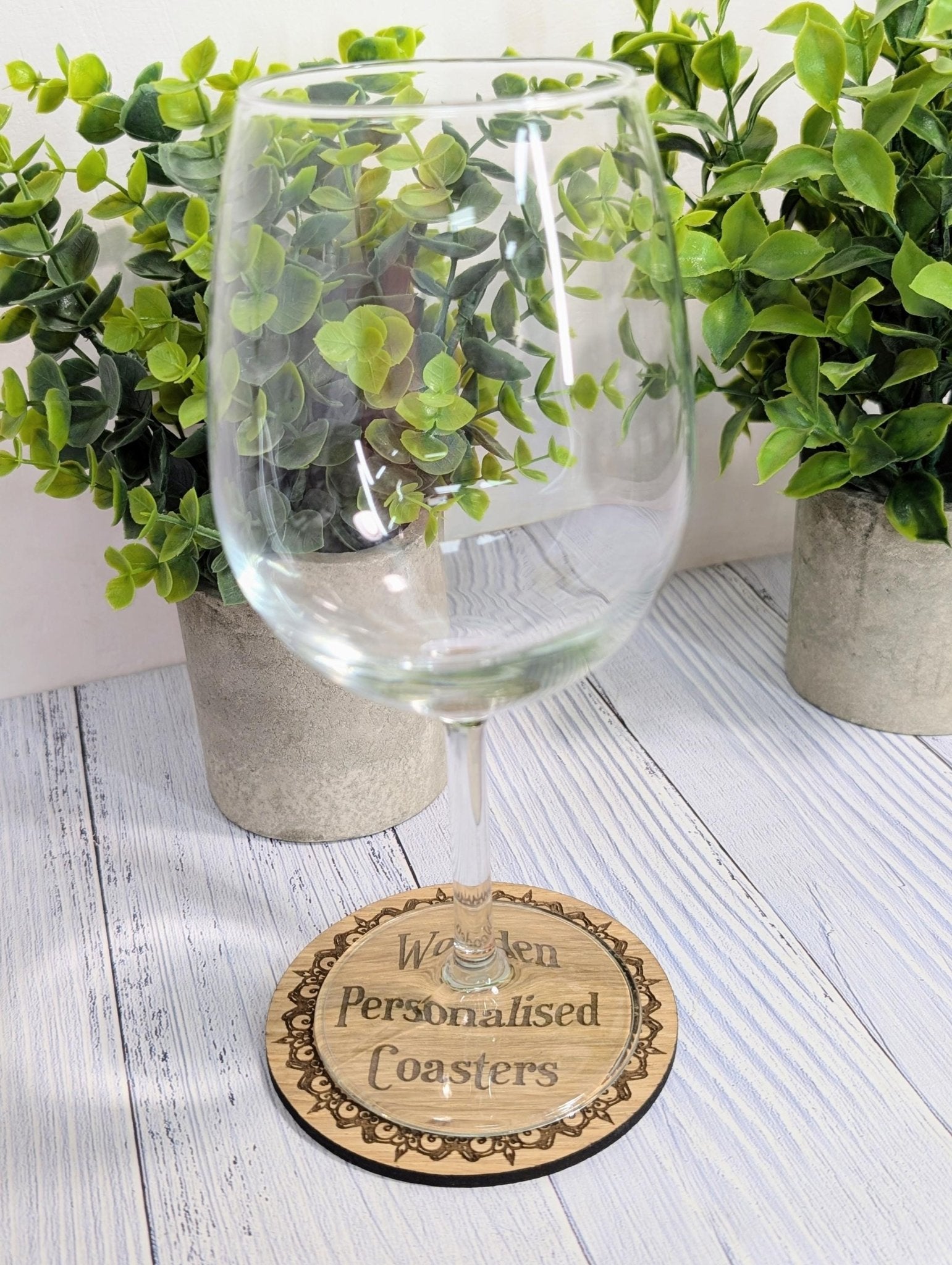 Personalised oak coaster with engraved border — made in North Wales
