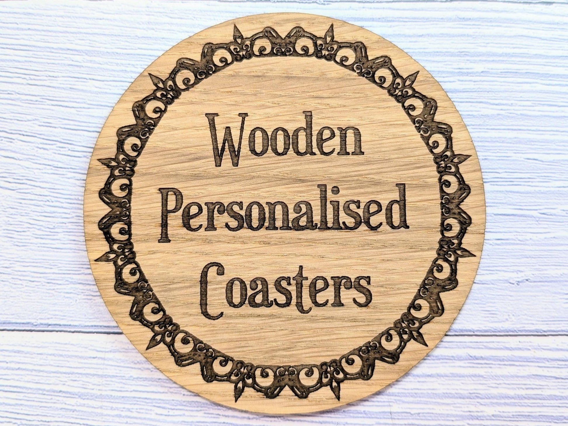 Pack of 6 engraved border oak coasters — 100mm, personalised