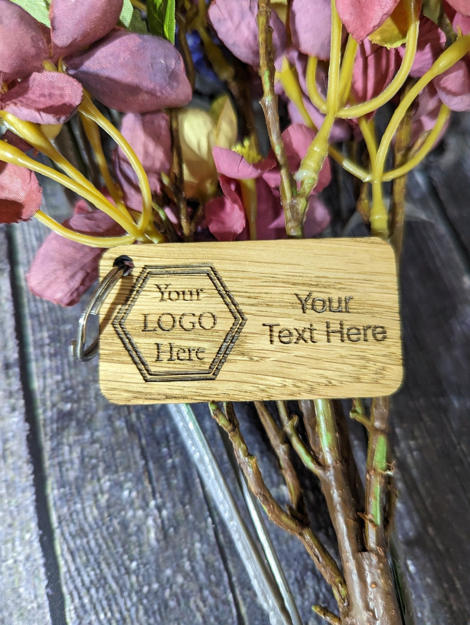 Custom branded oak keyrings — made to order in North Wales