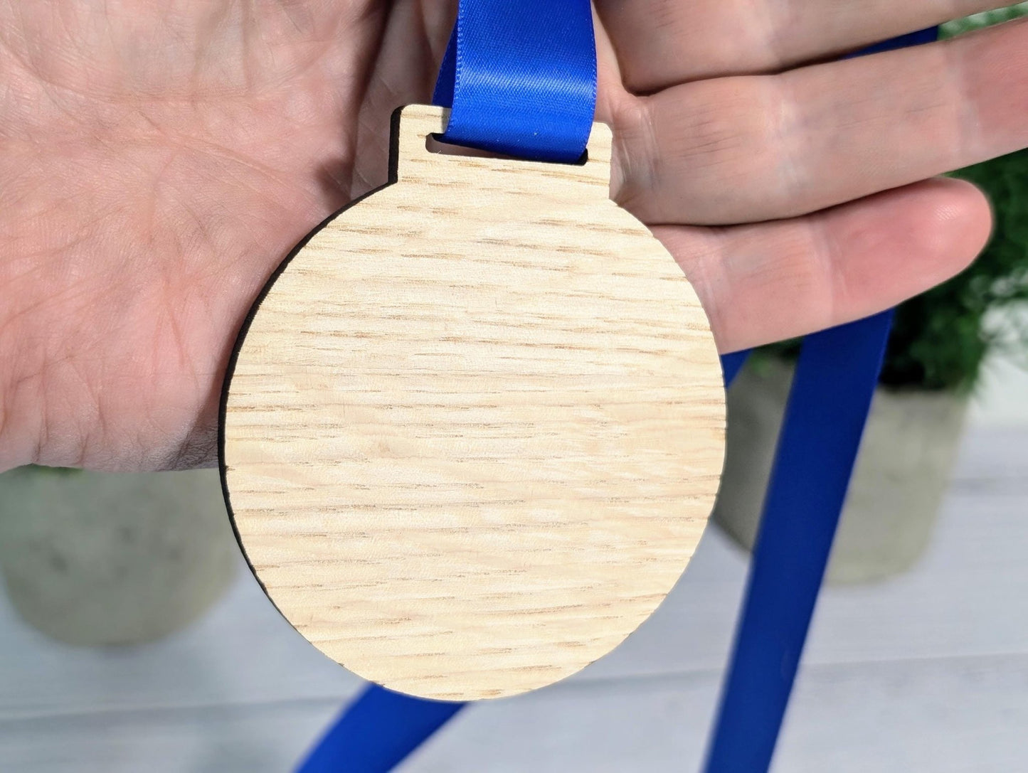 Custom wooden medals showing 1st 2nd 3rd position — oak, red white blue ribbon