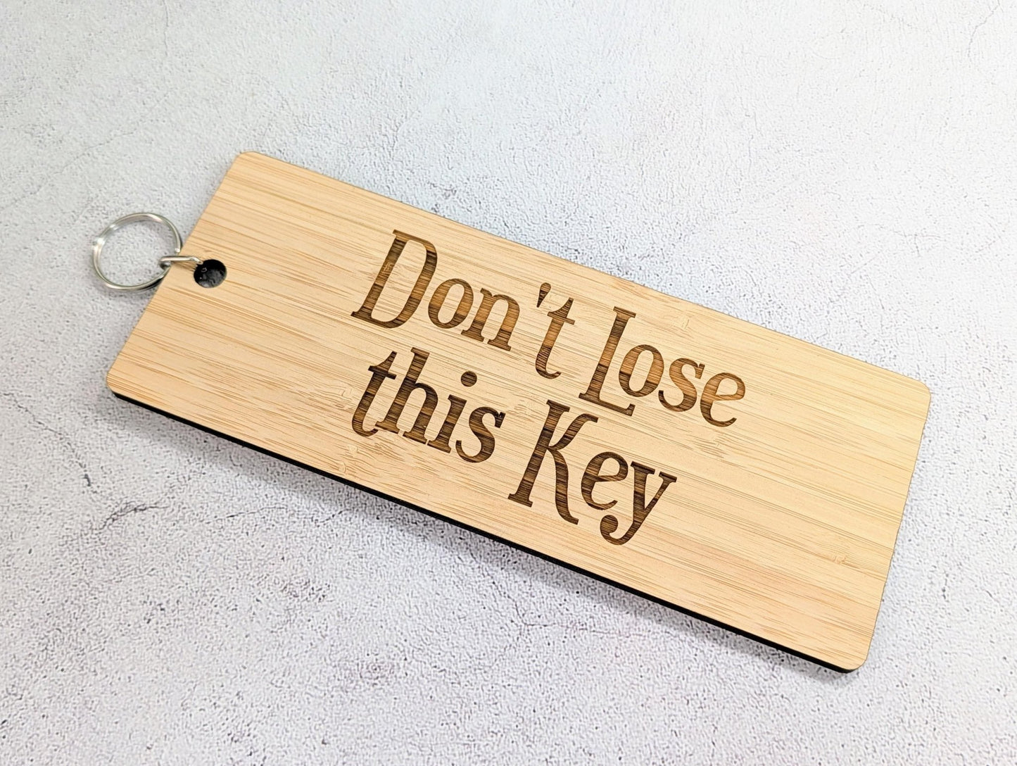 Don't Lose This Key oversized keyring engraved on 5mm FSC-certified Moso bamboo, 200x80mm