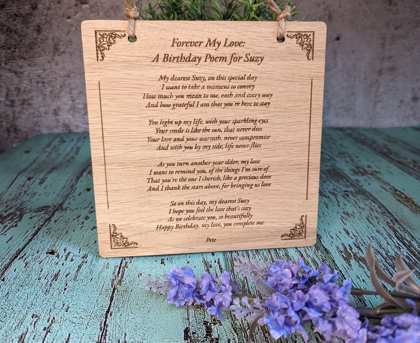 Personalised large poem sign close-up showing engraved text detail, oak