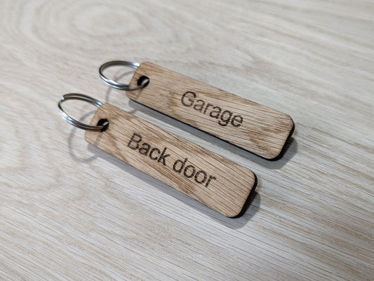 Oak keyring engraved with room name — ideal for hotel and guest house key sets