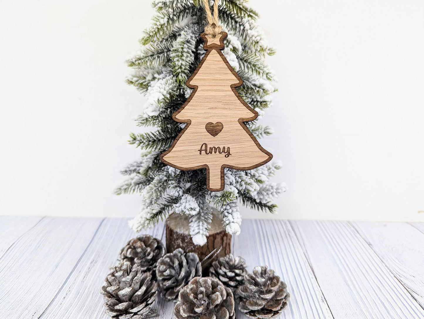 Personalised Christmas Tree-Shaped Bauble with Engraved Heart and Star - Oak Veneer