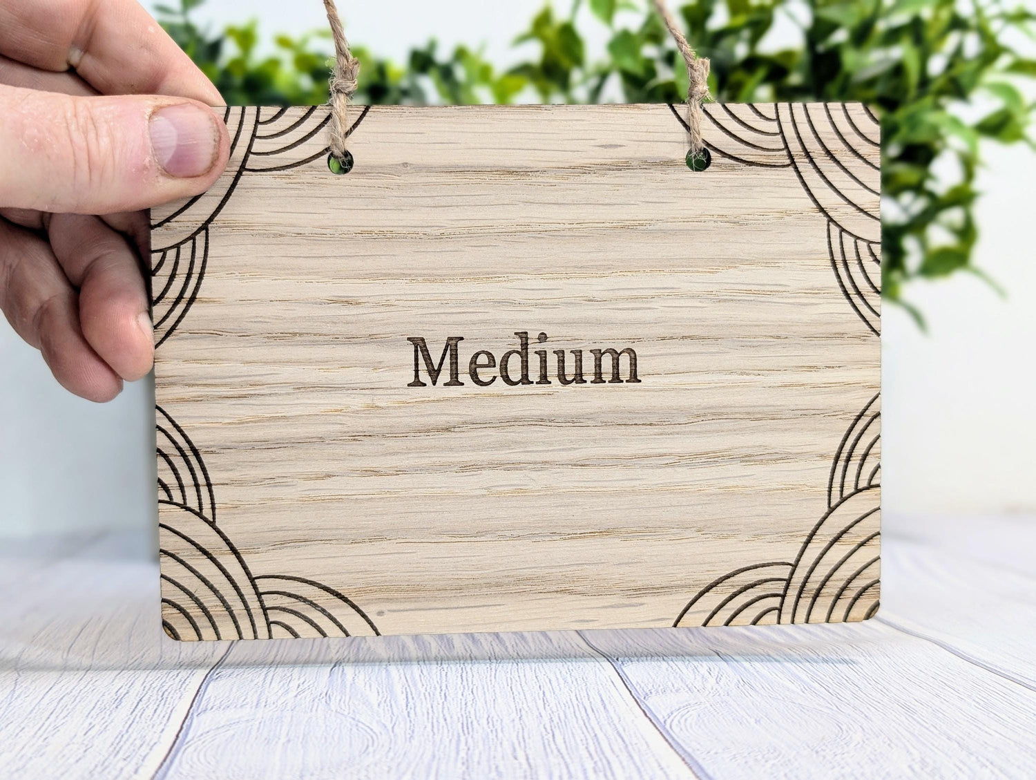 Personalised oak hanging sign — custom message, 4 sizes, jute string