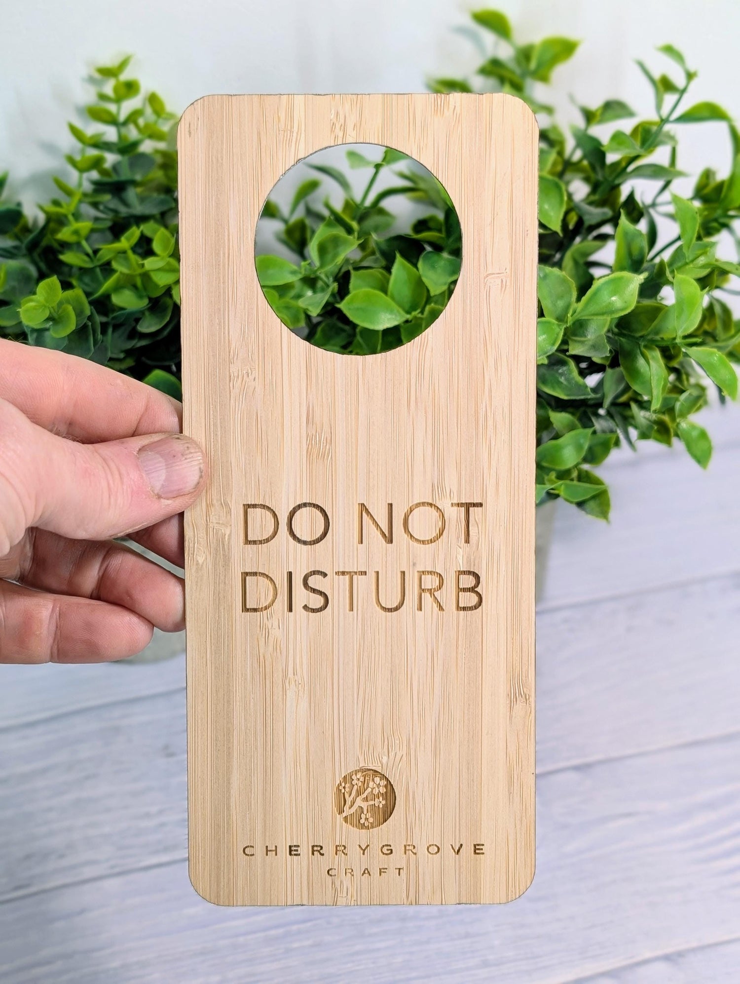 Bamboo hotel door hanger Do Not Disturb — boutique hotel and spa language