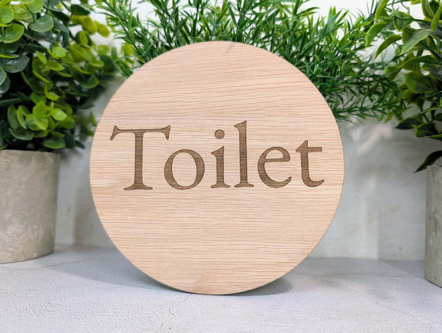 Toilet Door Sign – Circular Oak Veneered Wooden Bathroom Sign, Indoor Use Only, Handmade in Wales, Plastic-Free Packaging, 2 Sizes