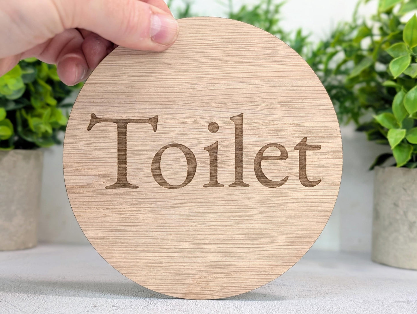 Toilet Door Sign – Circular Oak Veneered Wooden Bathroom Sign, Indoor Use Only, Handmade in Wales, Plastic-Free Packaging, 2 Sizes
