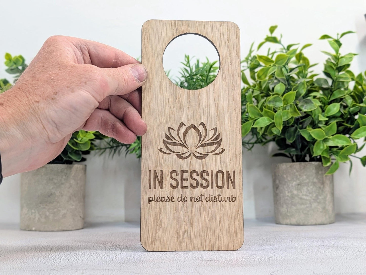 In Session Please Do Not Disturb oak door hanger with lotus flower design — 203x89mm, laser-engraved