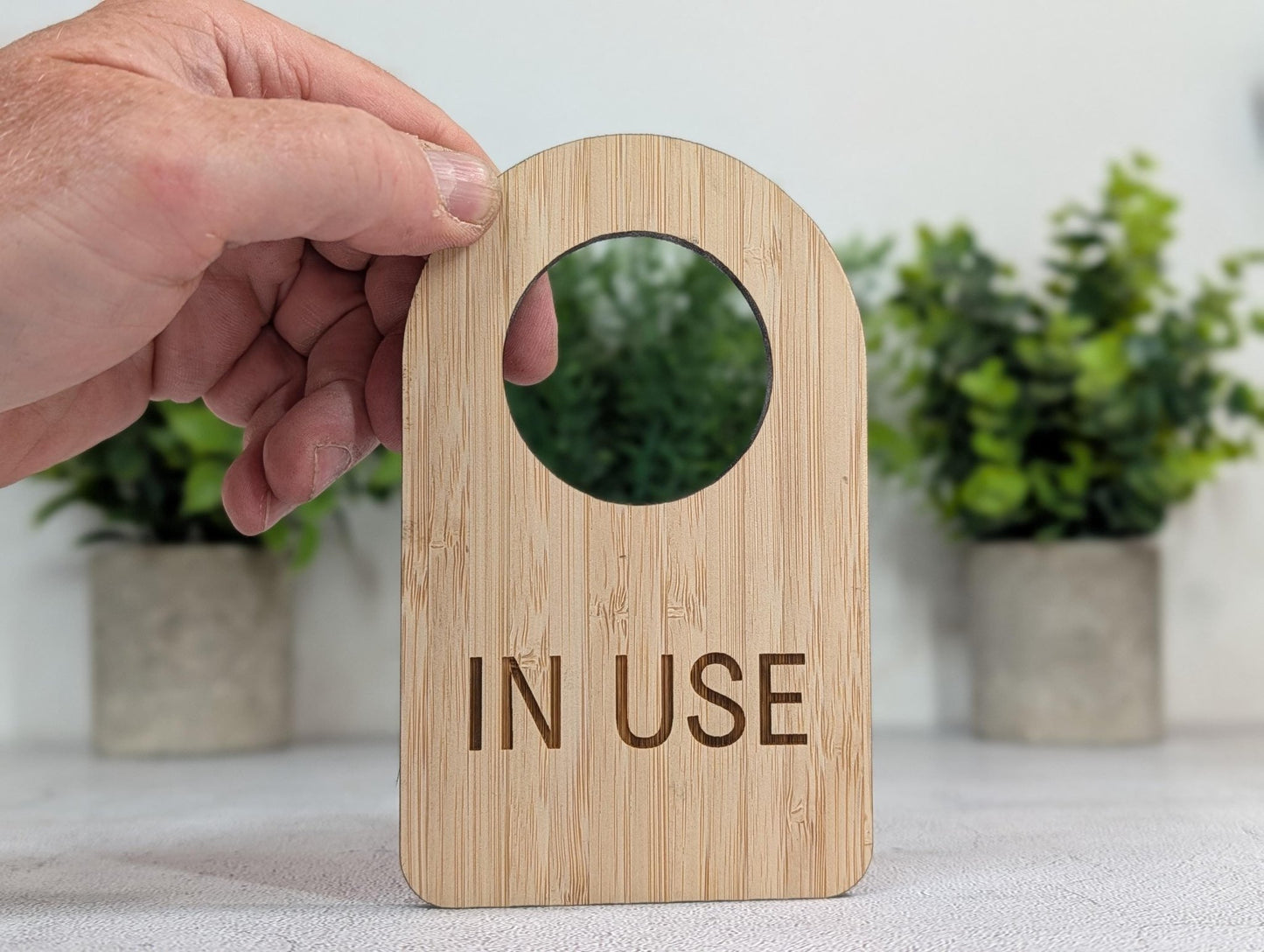 5mm bamboo In Use / Free door hanger showing the Free face