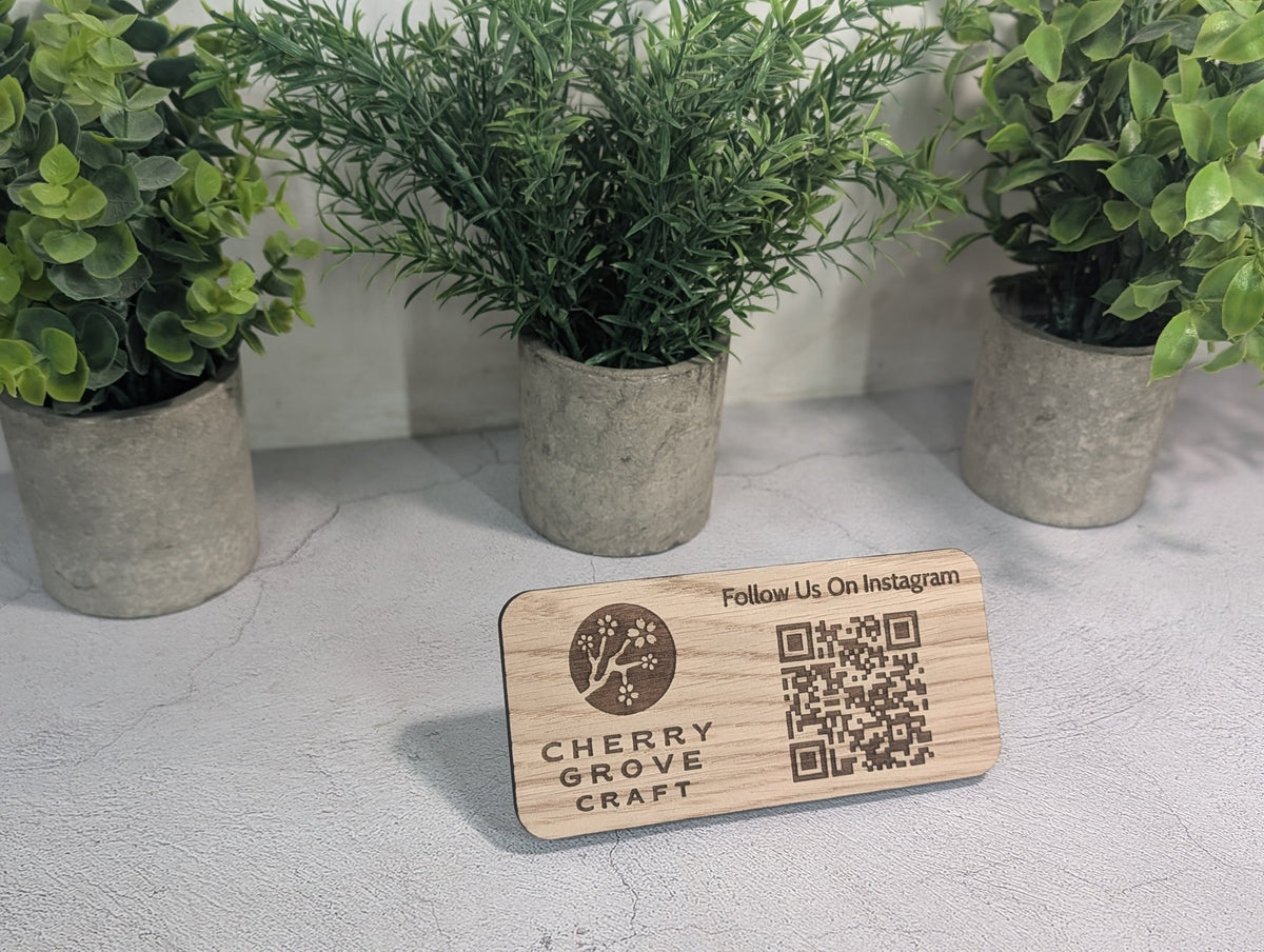 Instagram QR code stand seen at an angle, showing the engraved logo, Follow Us On Instagram wording and QR code