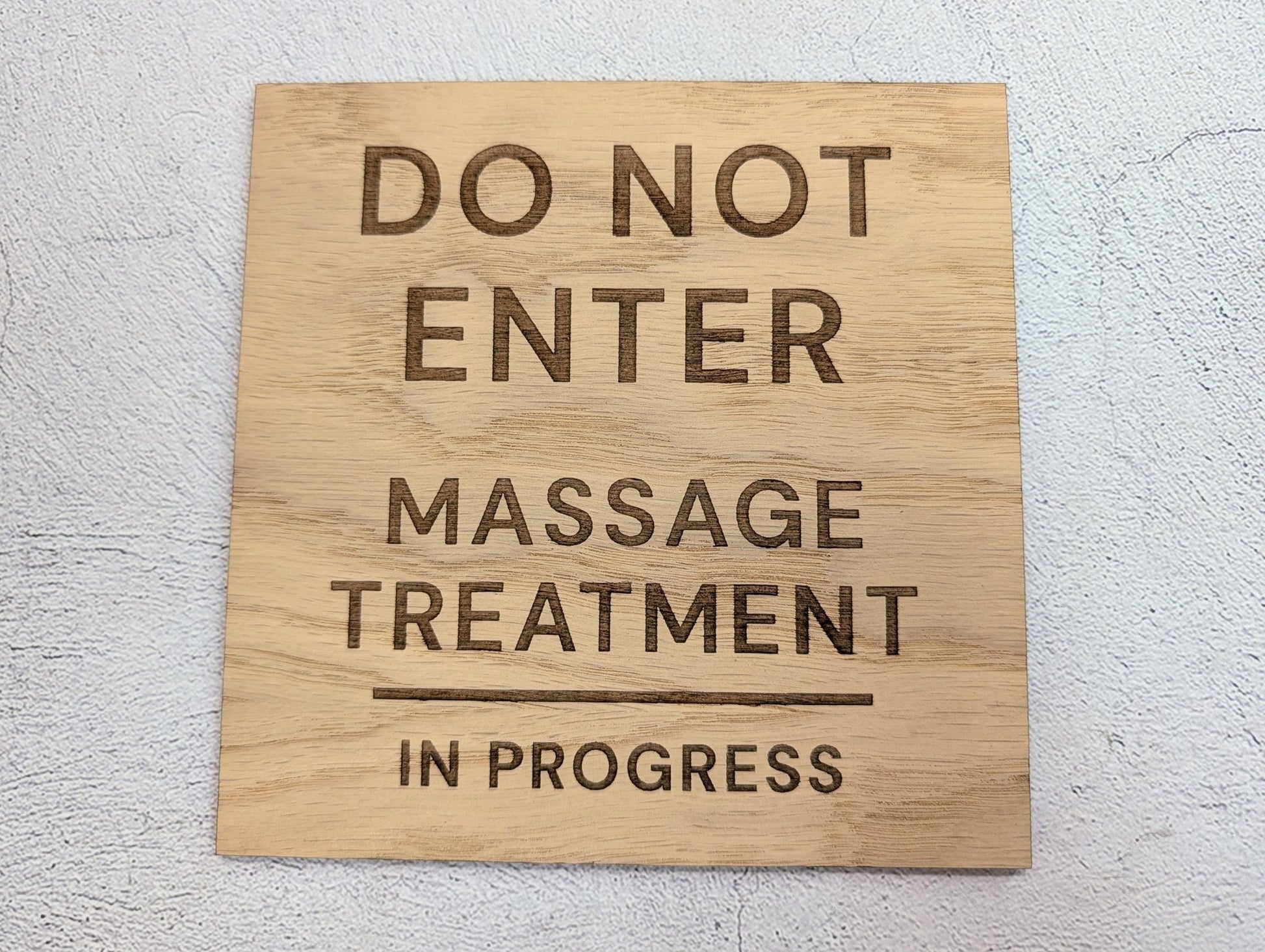Massage treatment in progress sign small size — 100x100mm square oak, laser-engraved wording