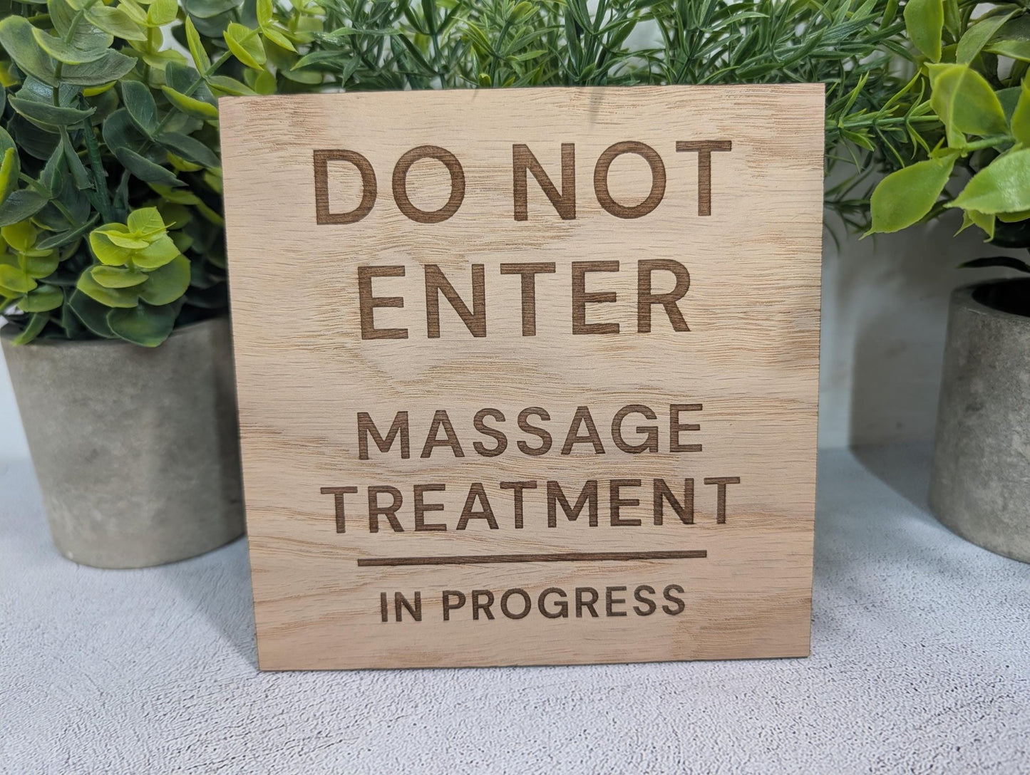 Do not enter massage treatment in progress — all three sizes shown together, Small to Large