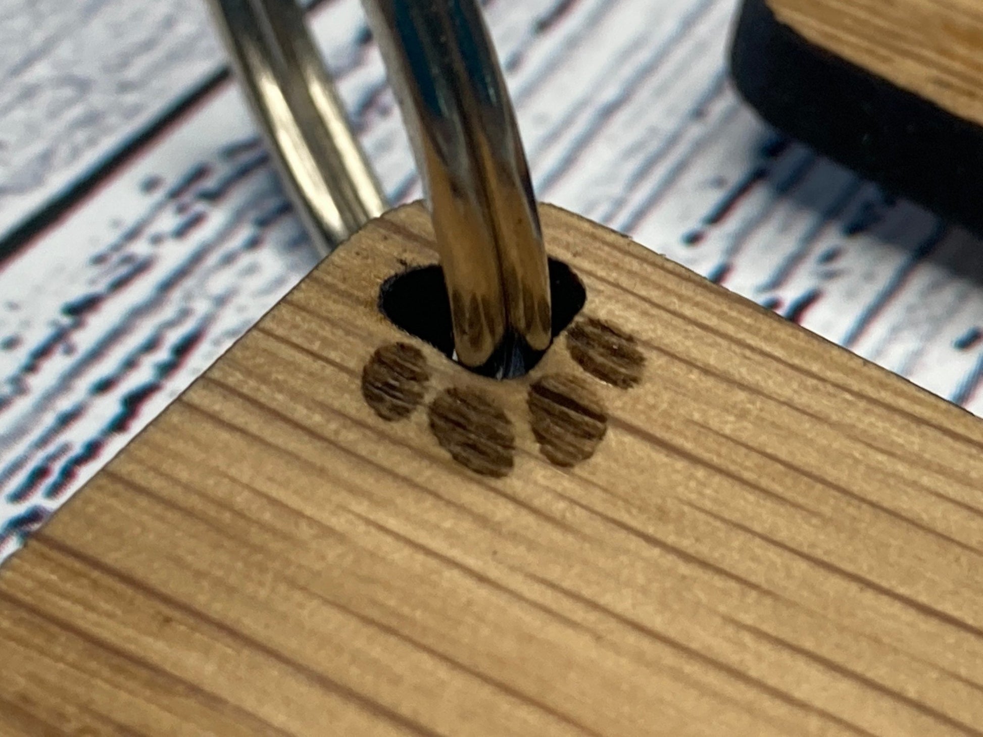 Personalised cat oak keyring — reverse side, smooth oak veneer finish