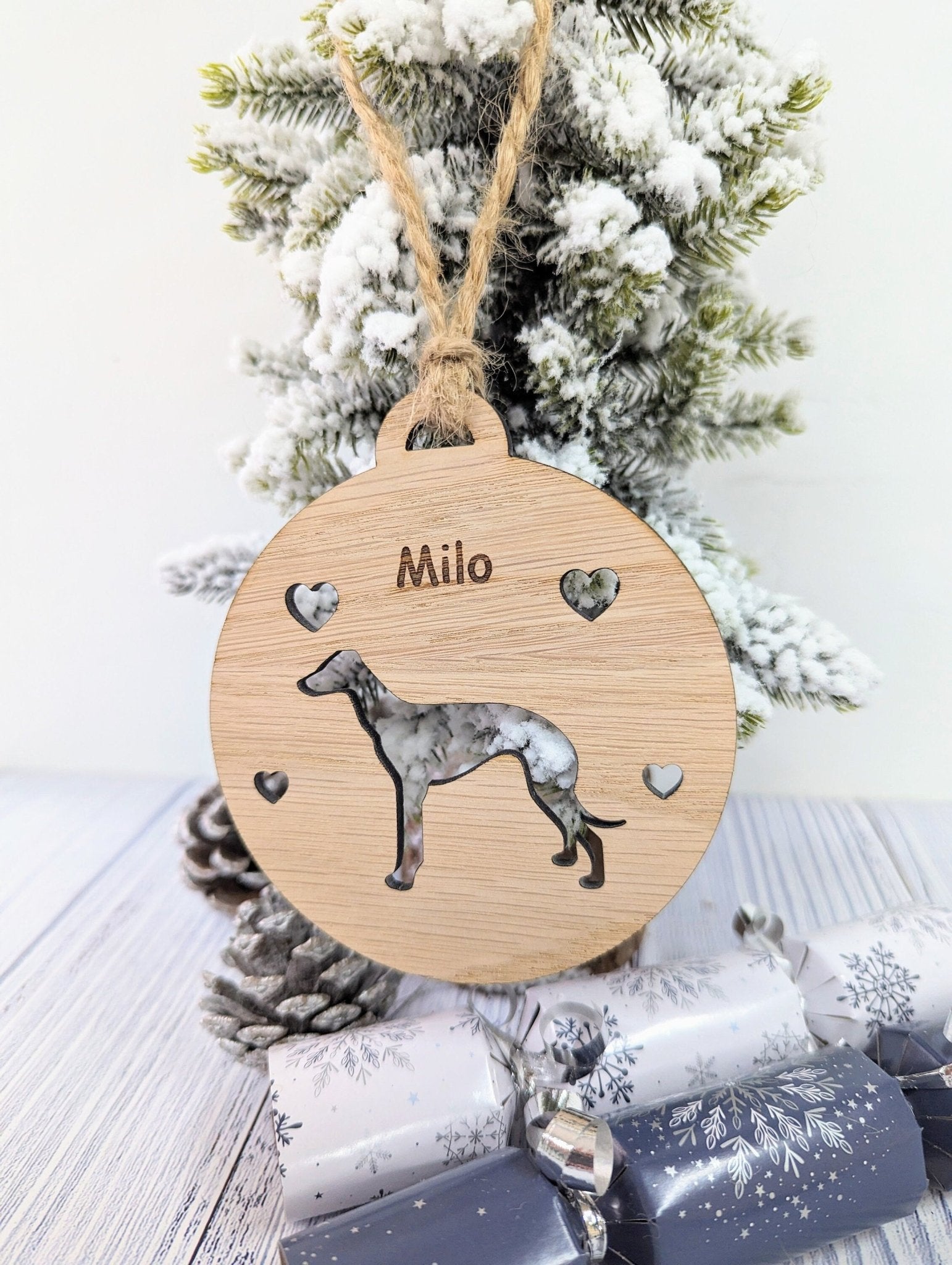 Greyhound Christmas bauble reverse — smooth oak veneer, jute string loop