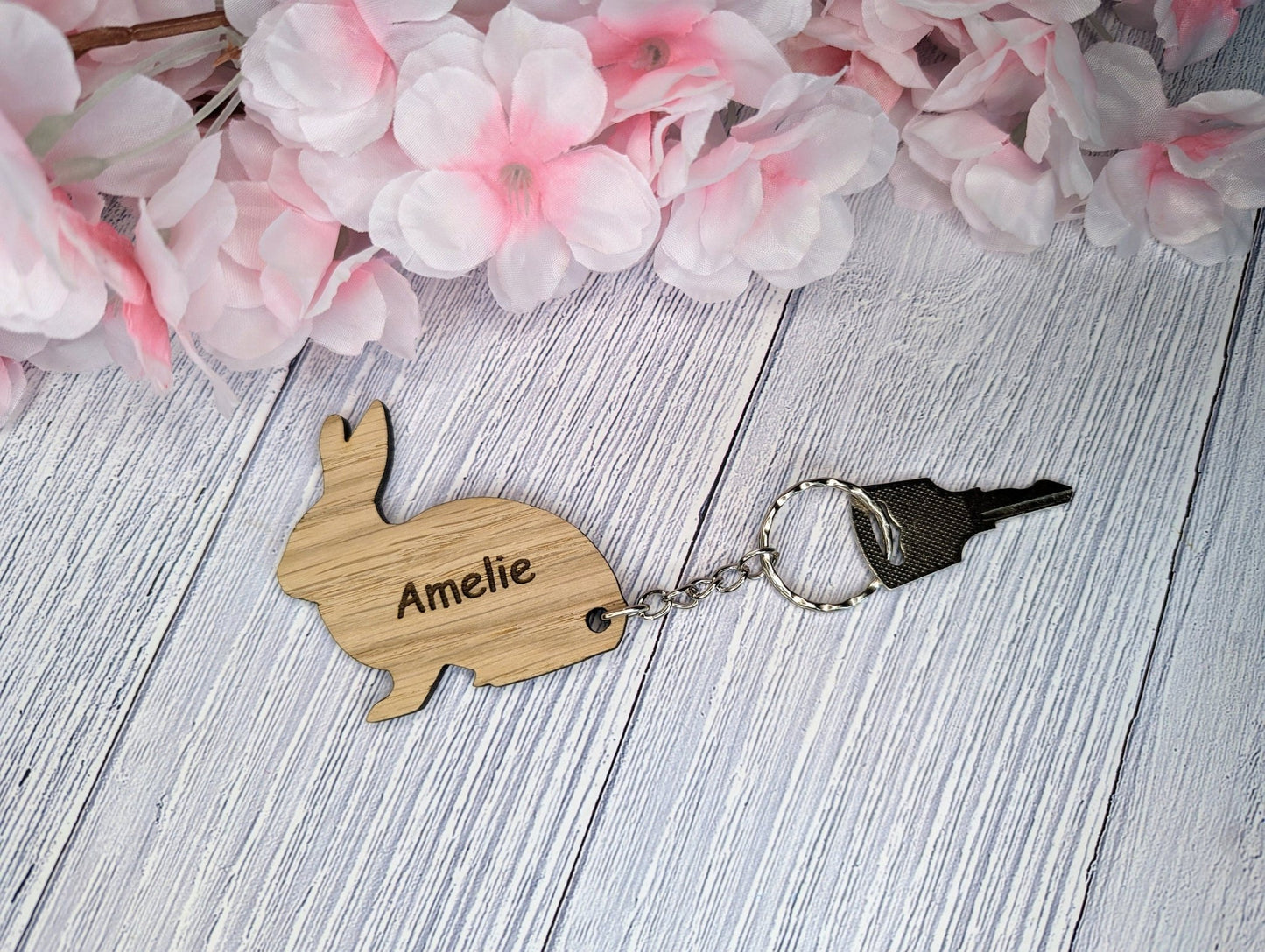 Rabbit keyring reverse — smooth oak veneer finish, split ring attached
