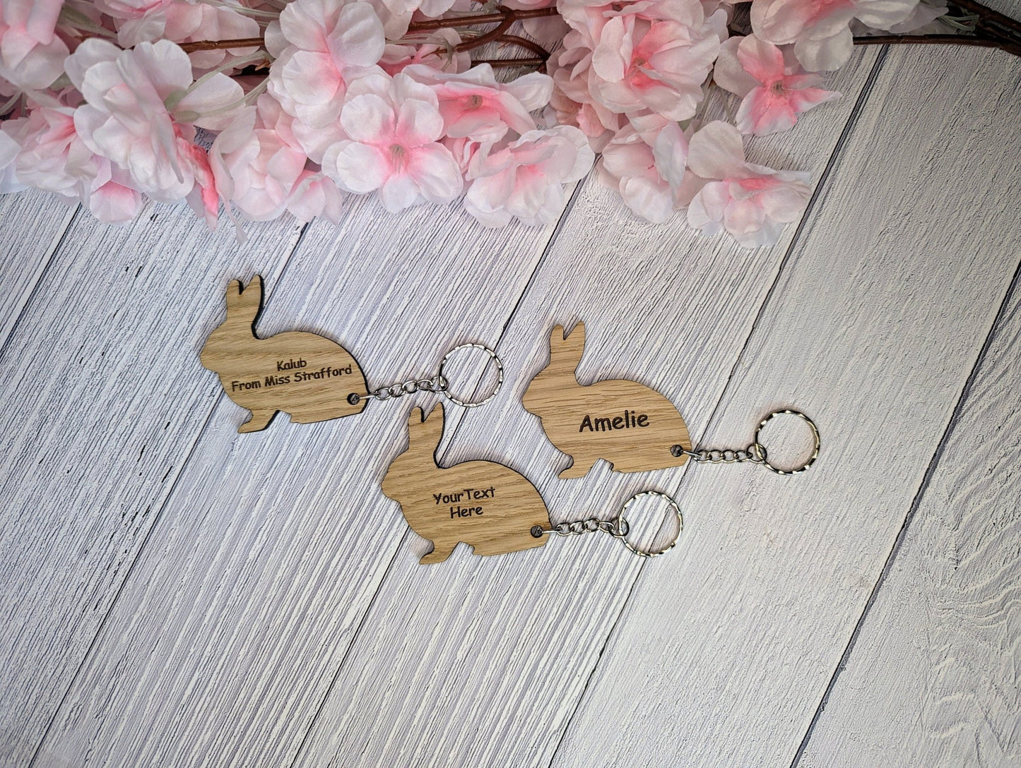 Personalised rabbit oak keyring — reverse showing smooth oak veneer, split ring