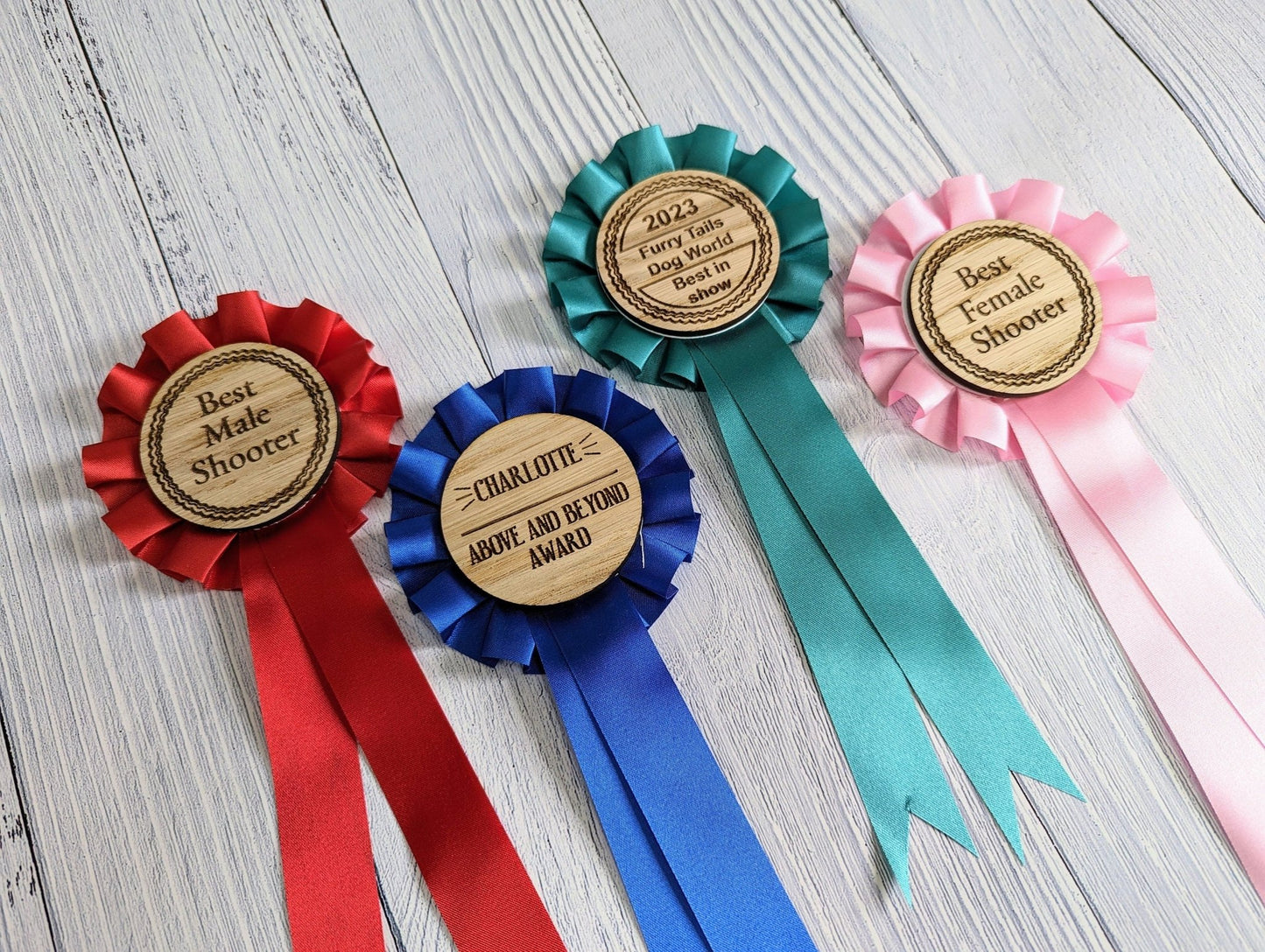 Horse show rosette in red — 60mm oak disc, personalised with event and name