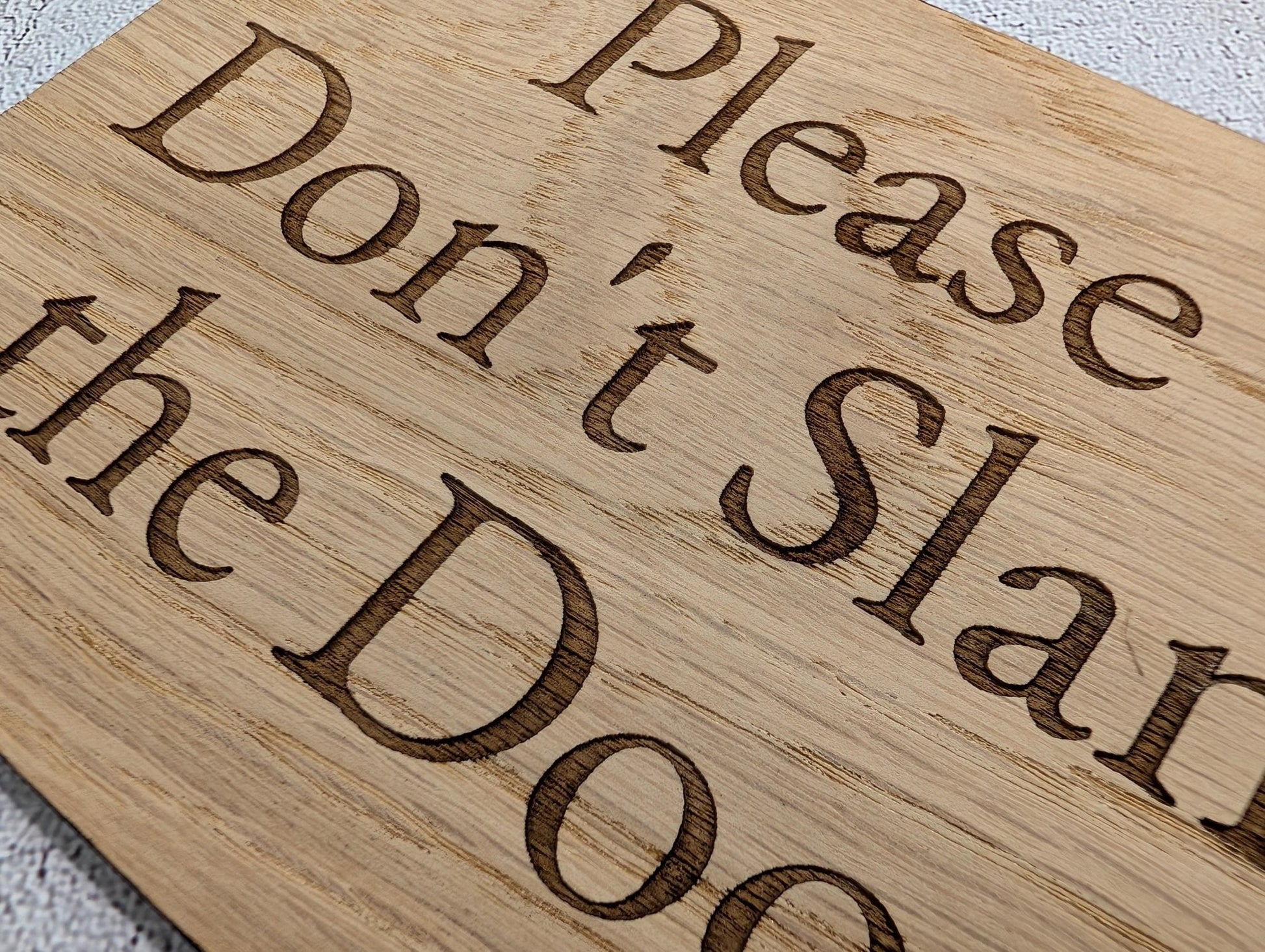 Don't Slam the Door hanging sign on bedroom door, oak veneered MDF