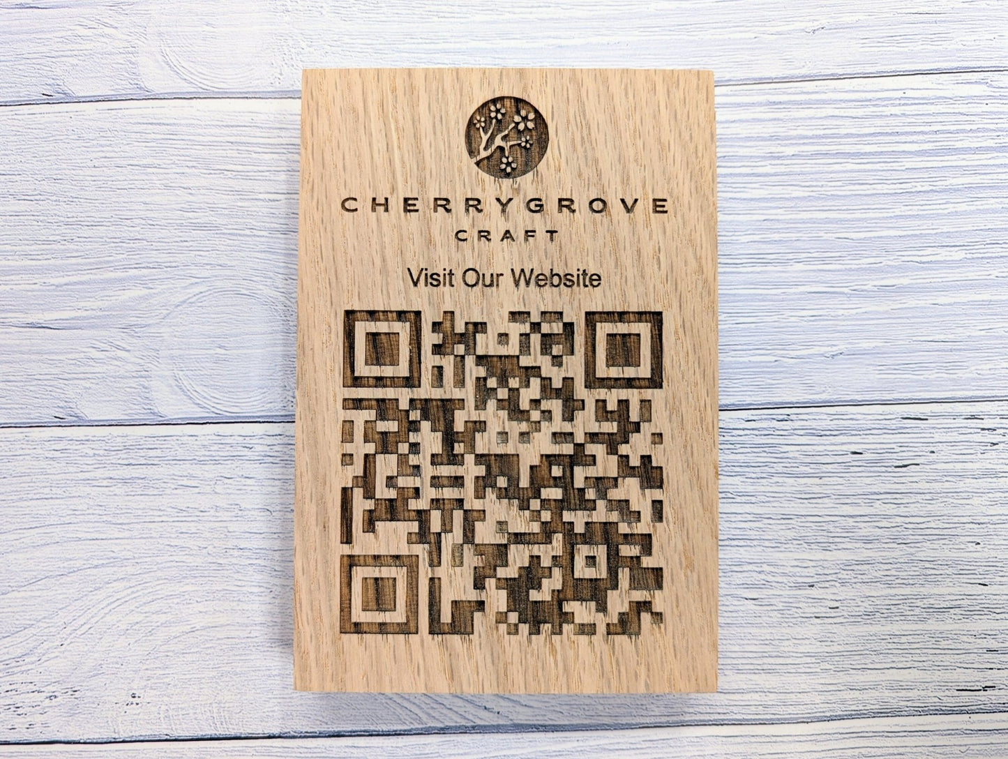 Double-sided QR code block on restaurant table — custom logo