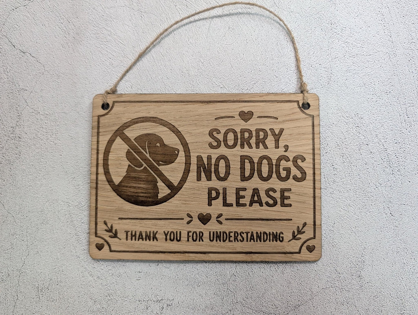 Sorry No Dogs Please sign shown in four sizes, oak veneer