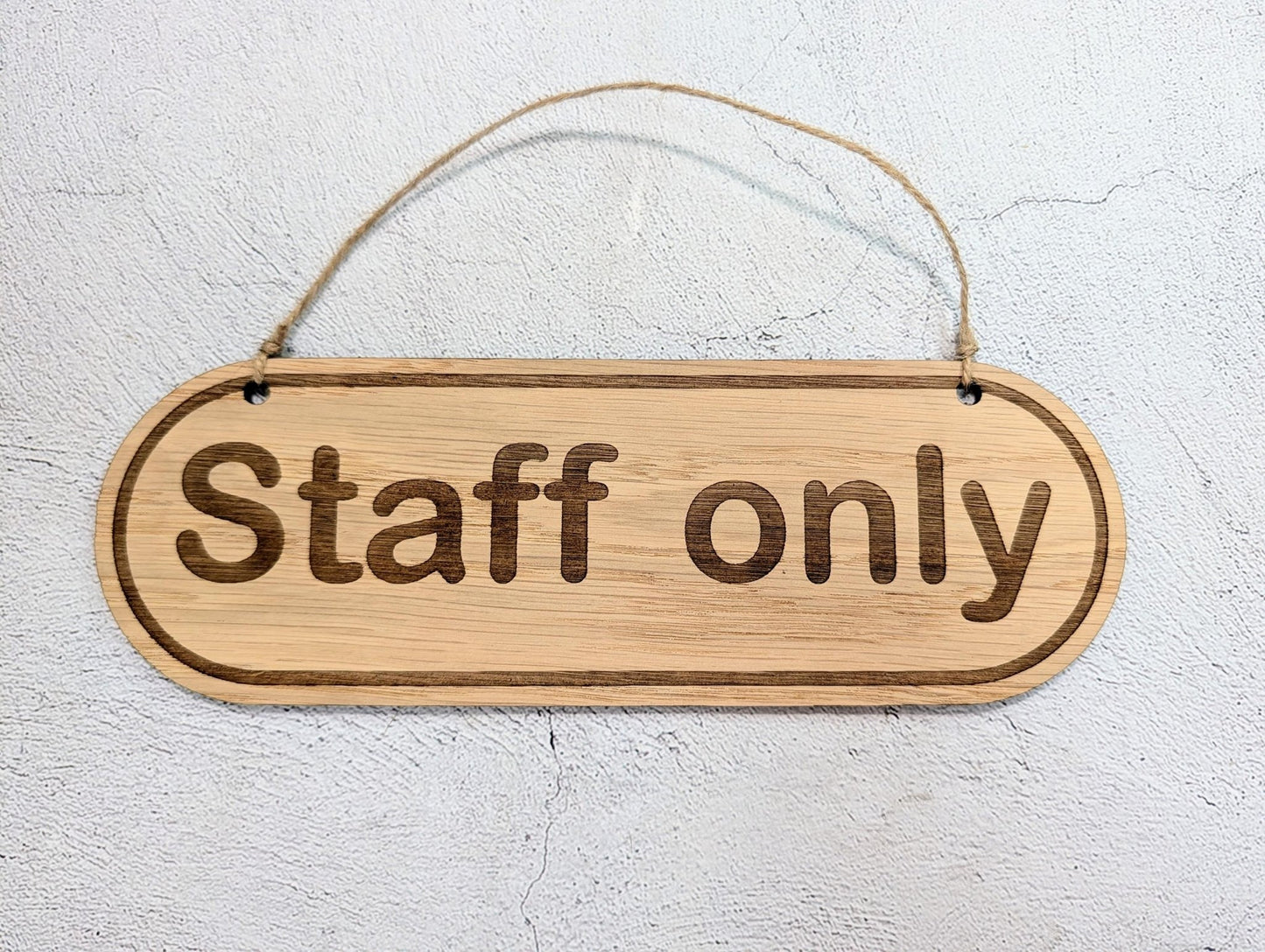 Staff Only oak sign — Large 225x75mm, shown on door in café setting