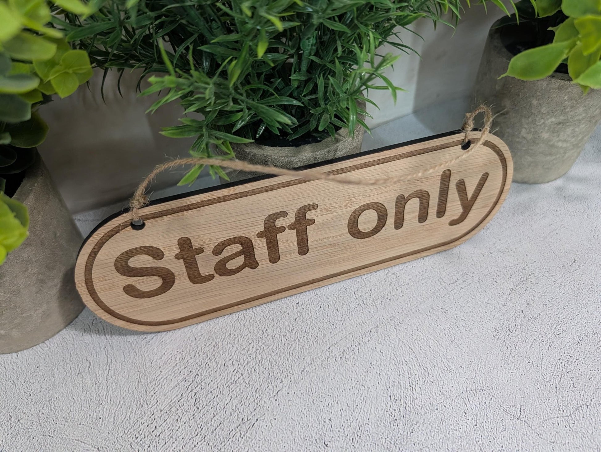 Staff Only oak sign reverse showing jute twine and pre-drilled hanging holes