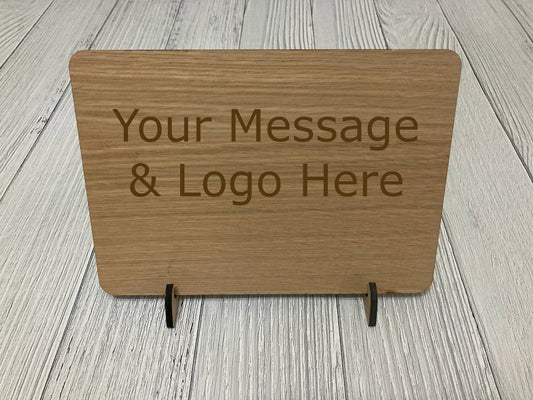 No Shoes No Shirt No Service sign close-up — engraved text on oak veneer