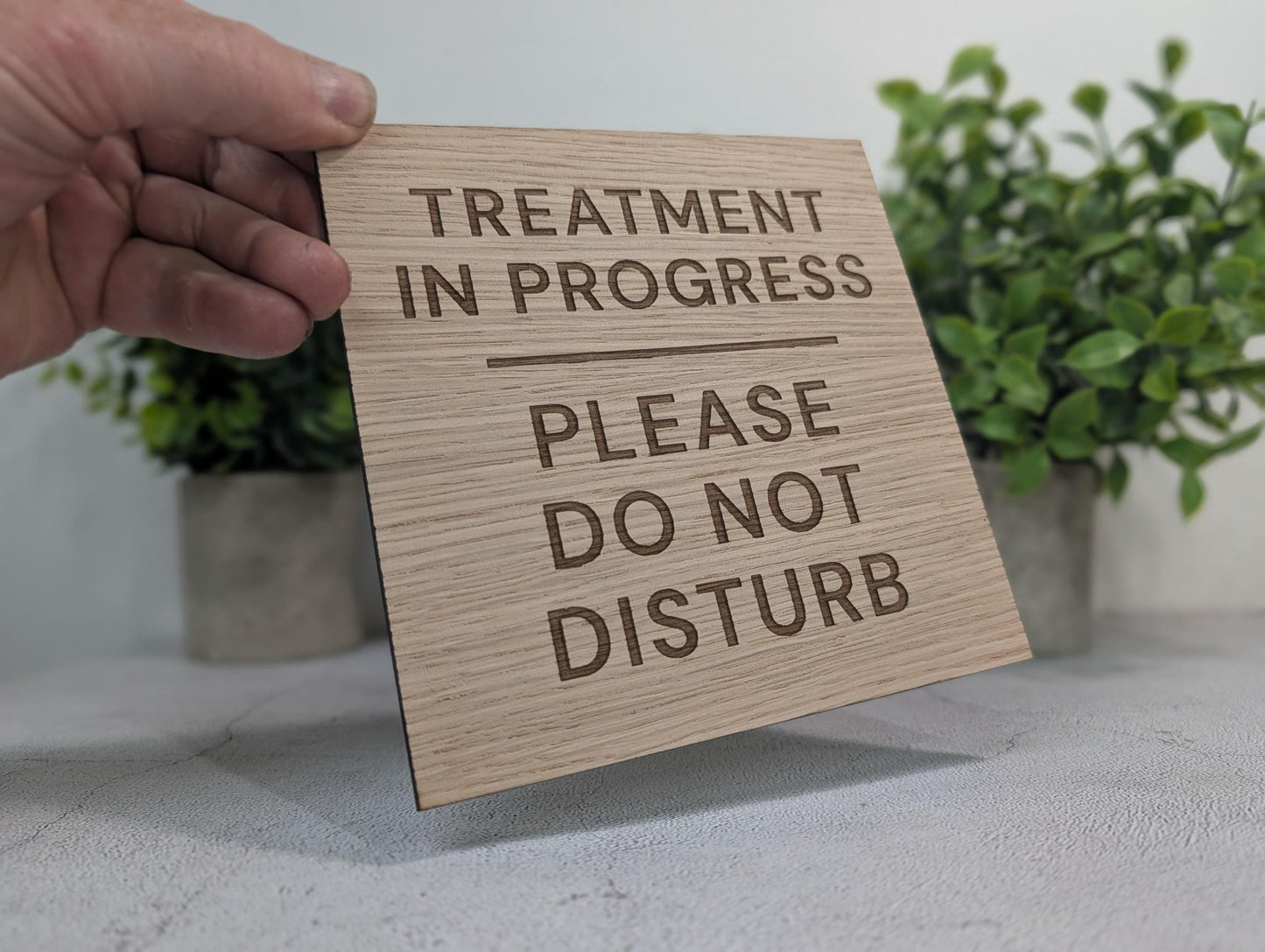 Treatment in Progress sign reverse showing pre-drilled holes