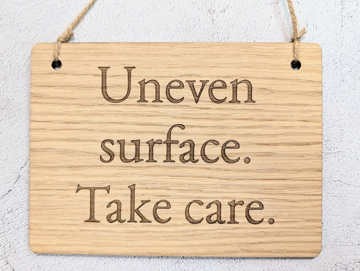Uneven Surface Take Care Sign – Oak Veneered Wooden Hanging Sign, Personalised Text Option, Handmade in Wales, Eco Packaging - 4 Sizes - CherryGroveCraft