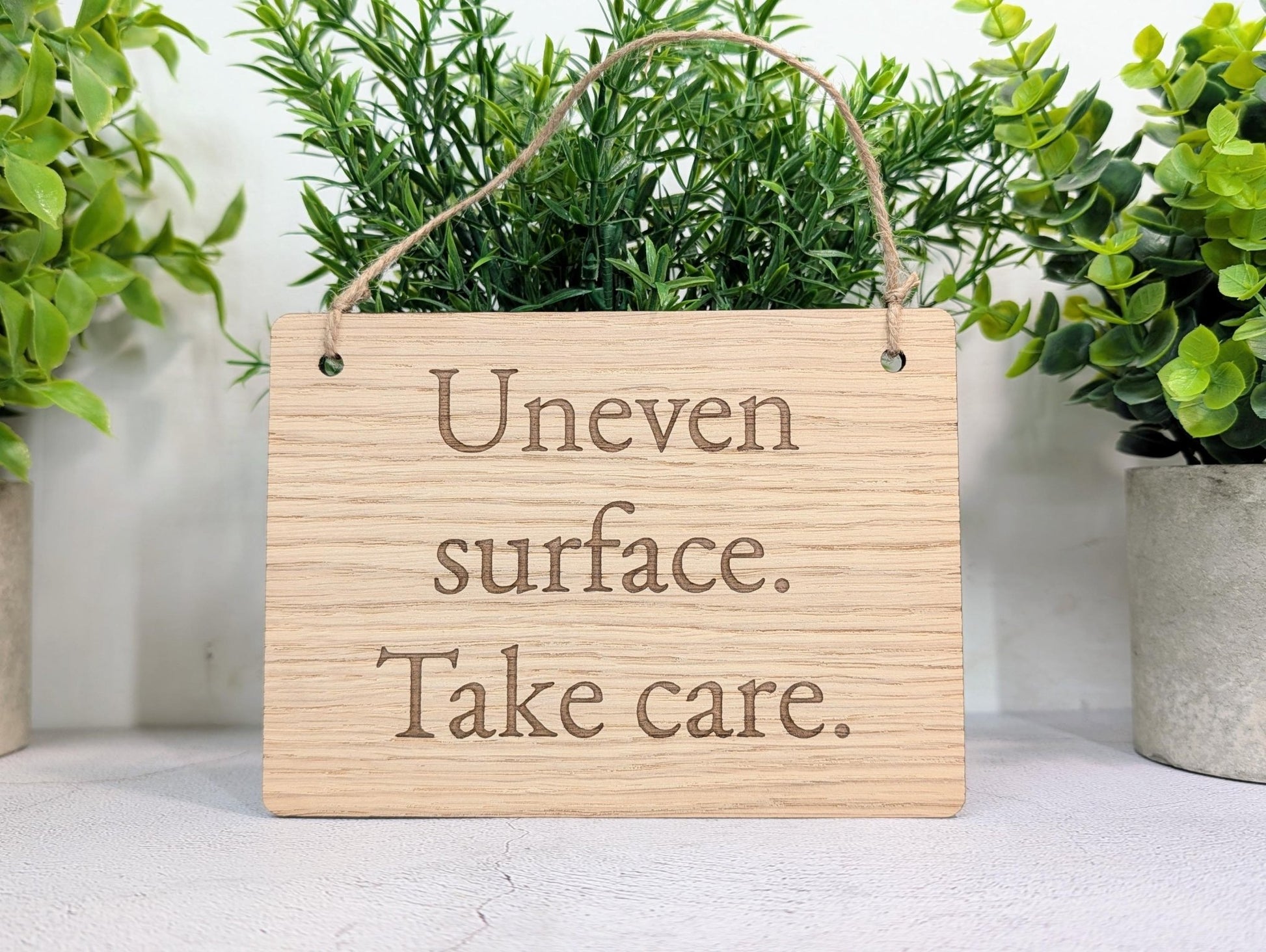 Uneven Surface Take Care Sign – Oak Veneered Wooden Hanging Sign, Personalised Text Option, Handmade in Wales, Eco Packaging - 4 Sizes - CherryGroveCraft