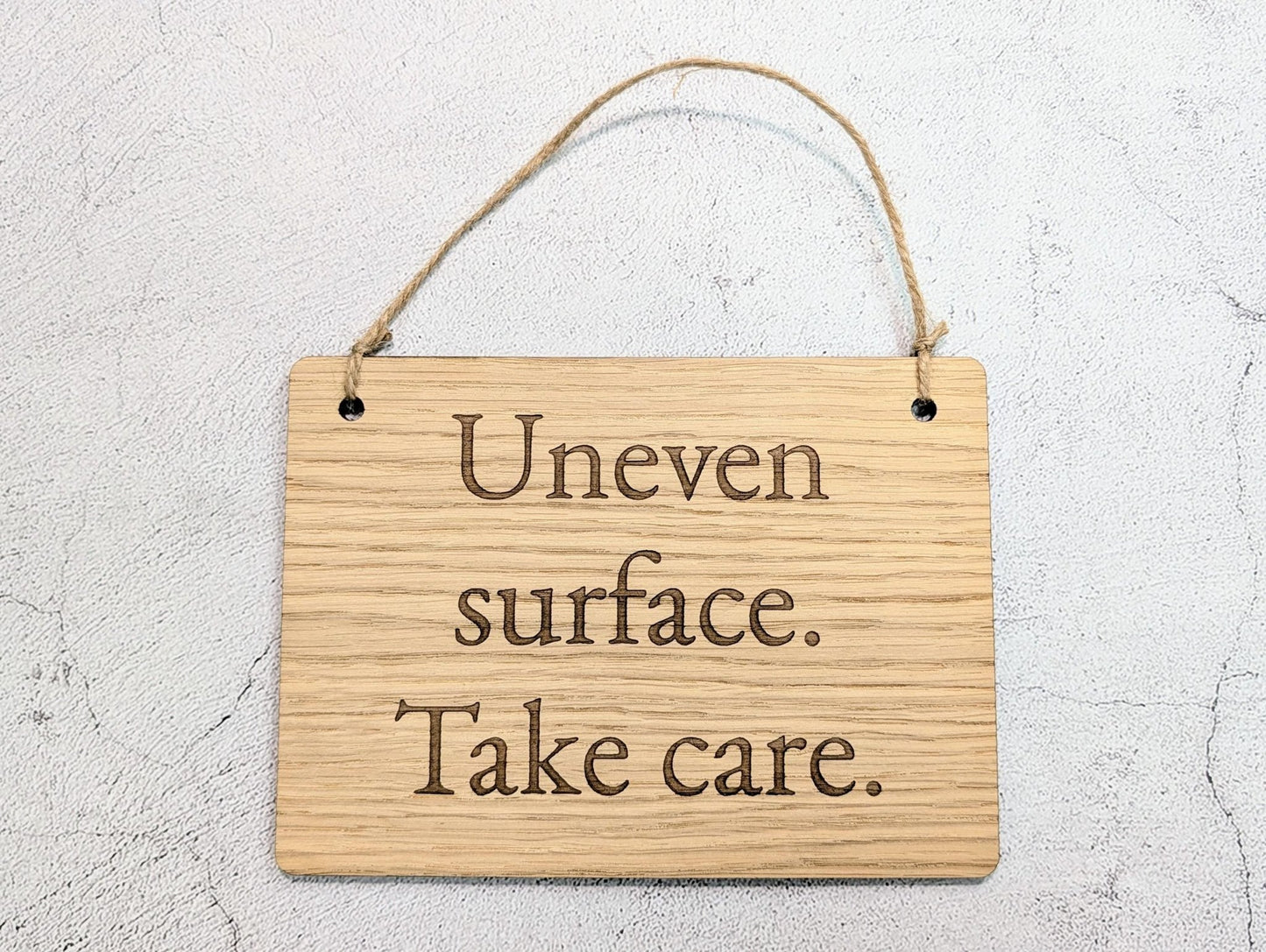 Uneven Surface Take Care Sign – Oak Veneered Wooden Hanging Sign, Personalised Text Option, Handmade in Wales, Eco Packaging - 4 Sizes - CherryGroveCraft